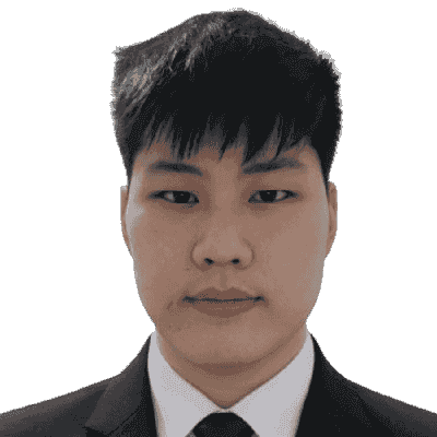Darren Maverick, head and shoulders, in a dark suit and navy tie.